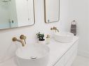 Ensuite, double vessel sinks, mirrors, cabinets
