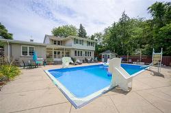 20ft x 40 ft in ground gas heated pool and electric hot tub in north side yard