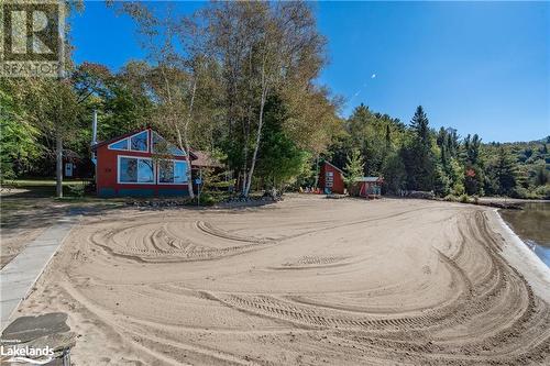 Cottage with bunkie and sauna further along beach