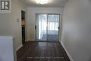 Dining Room with sliding patio doors to Sunroom