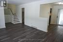Living Room with stairs to Second Level