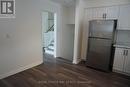Kitchen w/view to stairs upper and lower levels