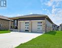 Large drive, double garage, access to lower level
