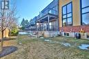 Rear covered main patio & open balcony above Rear covered main patio & open balcony above
