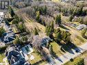 Aerial overview of property's location with nearby suburban area Aerial overview of property's location with nearby suburban area