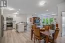 Open concept living/dining/kitchen.