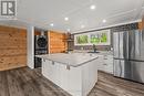 Convenient Island for Storage and Main Fl. Laundry Convenient Island for Storage and Main Fl. Laundry