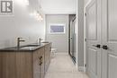 Ensuite with large linen closet