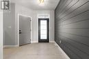 Foyer with door to garage
