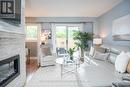 luxury w/ the inset fireplace surrounded by stone luxury w/ the inset fireplace surrounded by stone