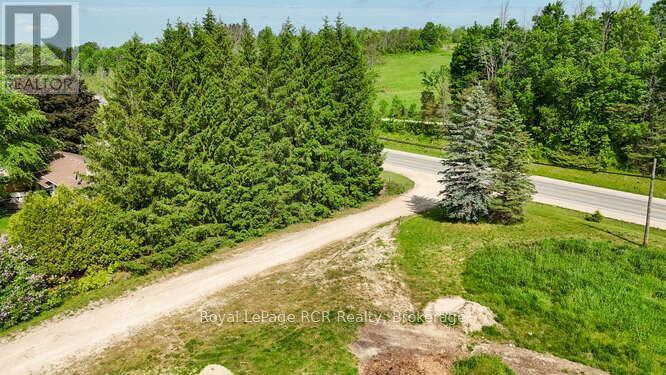 












202122 21 HIGHWAY

,
Georgian Bluffs,







Ontario
N4K5N7

