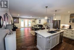 Front foyer features garage entry to the left