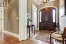 Large mahogany front door Main Foyer with closet