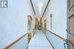 Soaring ceiling and dbl closet in foyer