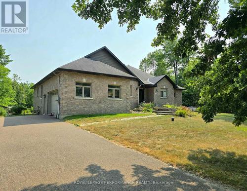 Large side parking, entrance & double garage Large side parking, entrance & double garage