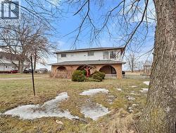 View of front facade with a front lawn