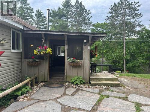 Entrance to Porch with Stone Walkway