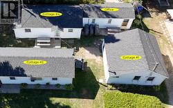 5 cottages; office w laundry ; 2 sheds; parking