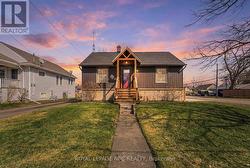 Perched on a corner lot facing west