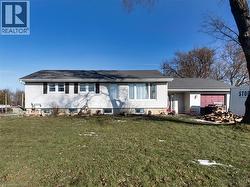 View of front of property featuring a front yard