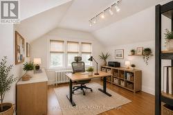 virtually staged could be office or primary bedroo