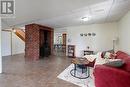 Ground Level Rec Room with Wood Stove