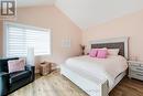 Primary Bedroom with Cathedral Ceiling and Ceiling