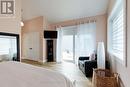 Primary Bedroom with Patio Doors to Private Deck