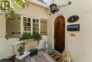 Custom front door with speakeasy. Antique fixture.