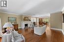 Open concept main floor, adjacent sunroom. Refinished quarter-cut oak flooring.