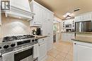 Jenn-aire dual fuel range. Adjoins family room (currently used as a breakfast room).
