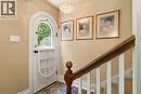 Original front door (folds down). Silk curtain available. Stairway to upper level