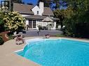 18 by 36 vinyl pool, concrete surround. Pump and filter cartridges (replaced 2024). Pool shed. 2024 photo showing hydrangea in bloom