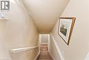 Stairway down to unfinished basement.