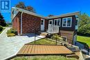 rear access from garage and stairs to yard