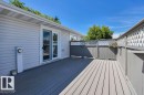 Spacious outdoor deck featuring composite decking in a two-tone finish
