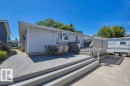 Expansive exterior deck featuring a multi-level design and a lattice privacy screen