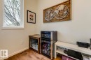 Hardwood-finish flooring with white baseboards