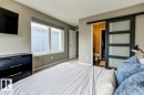 Bedroom featuring light gray carpet flooring and neutral wall tones