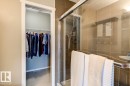 Walk-in closet with wire shelving and carpet flooring