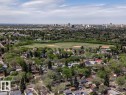 Aerial perspective showcasing a residential area with mature trees