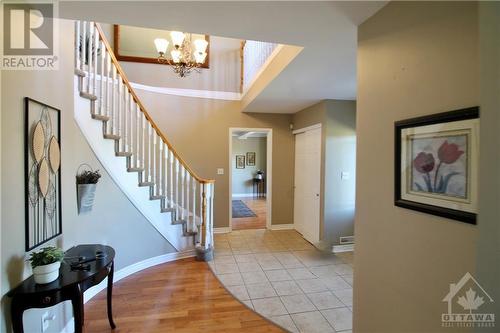 Spacious foyer with curved staircase