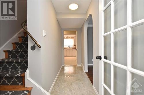 Foyer with closet and a french door.