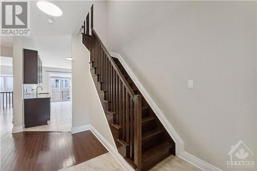 Exquisite hardwood stairs to second floor