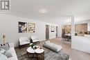 Family rm w/upgraded hdwd floors(virtually staged) Family rm w/upgraded hdwd floors(virtually staged)