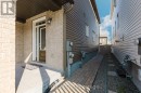 Paved side passage to backyard Paved side passage to backyard