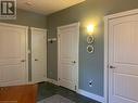 Foyer entry area offers plenty of storage areas including large closet, linen closet, laundry room and mechanical/workshop room.