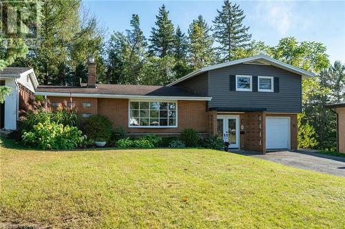 beautiful house on wooded lot