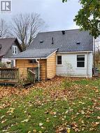 Back of house featuring a yard