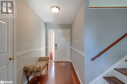 Foyer featuring hardwood / wood-style flooring